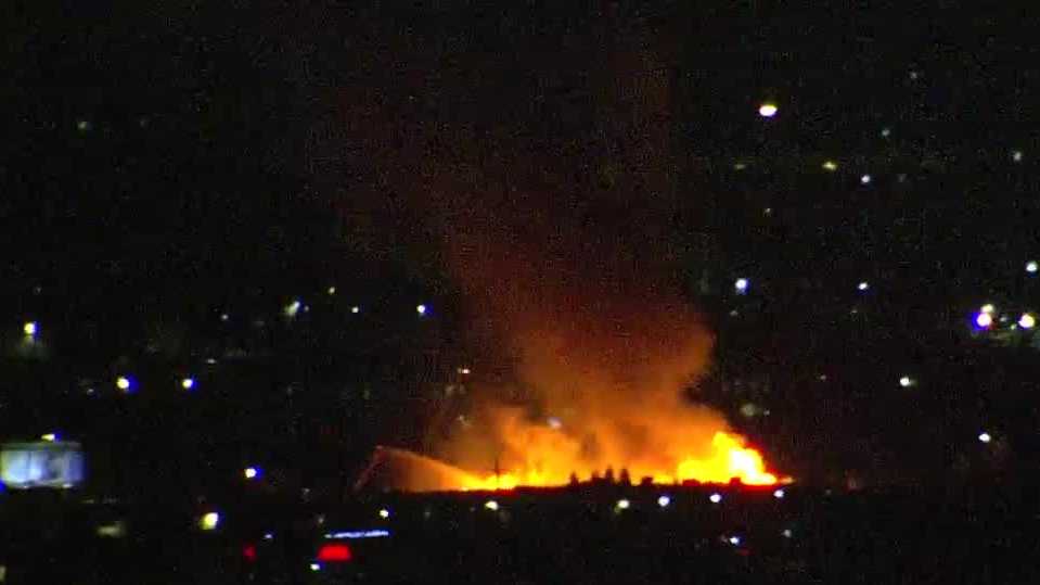 Large fire breaks out at pallet yard in Sacramento