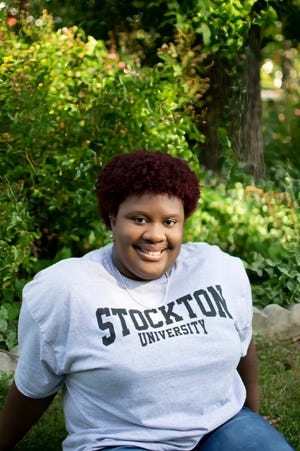 Damaris Anne-Spring of Willingboro, NJ, commits to Stockton University after receiving more than $2 million in scholarship money and acceptance letters from 26 colleges and universities.
