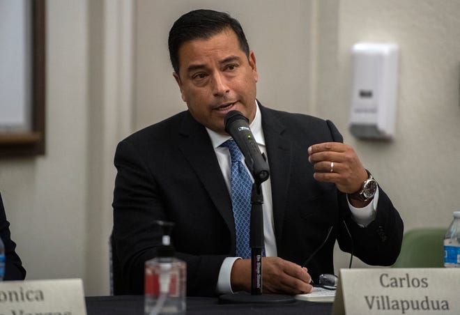 Assemblyman Carlos Villapudua participates in a candidates forum for the 13th District of the State Assembly at the South Forum on the San Joaquin Delta College campus in Stockton on Tuesday, Sept. 14, 2022.