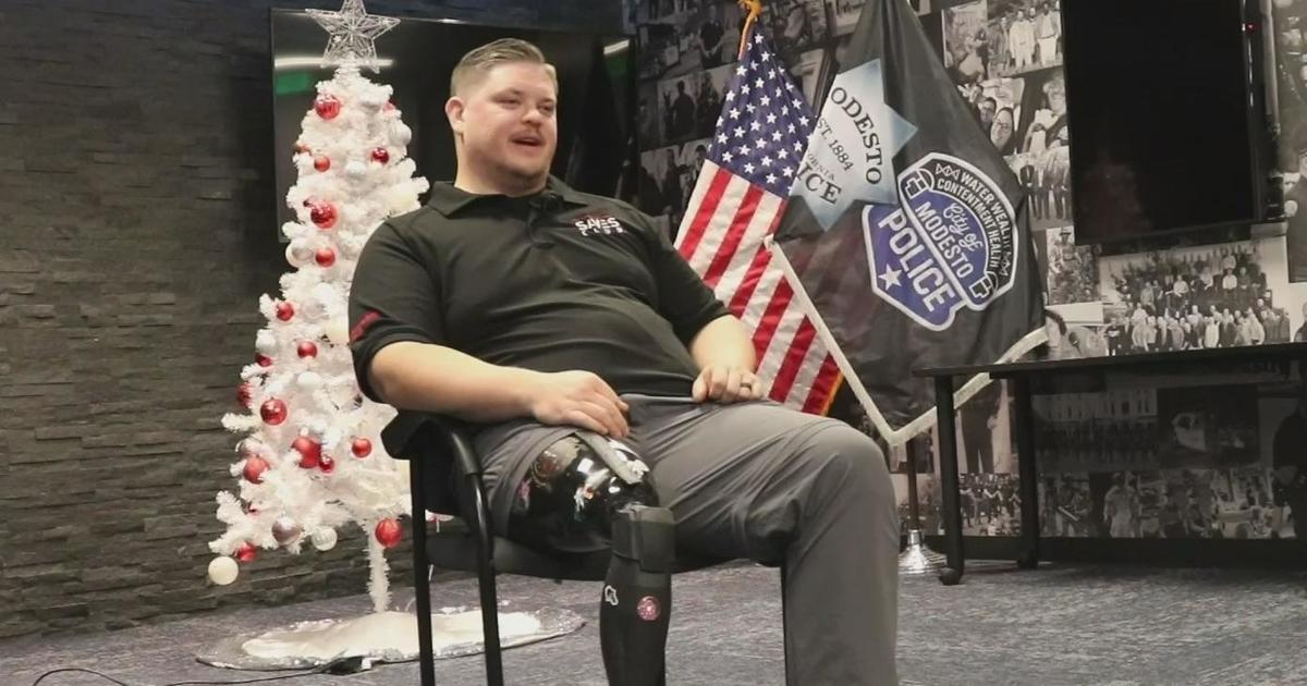 "Happy to be alive": Modesto cop who lost leg in shootout attack returns to the job