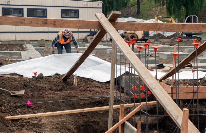 Work continues on the Homeless Navigation Center at the Stockton Shelter for the Homeless in downtown Stockton on Thursday, Dec.  8, 2022.
