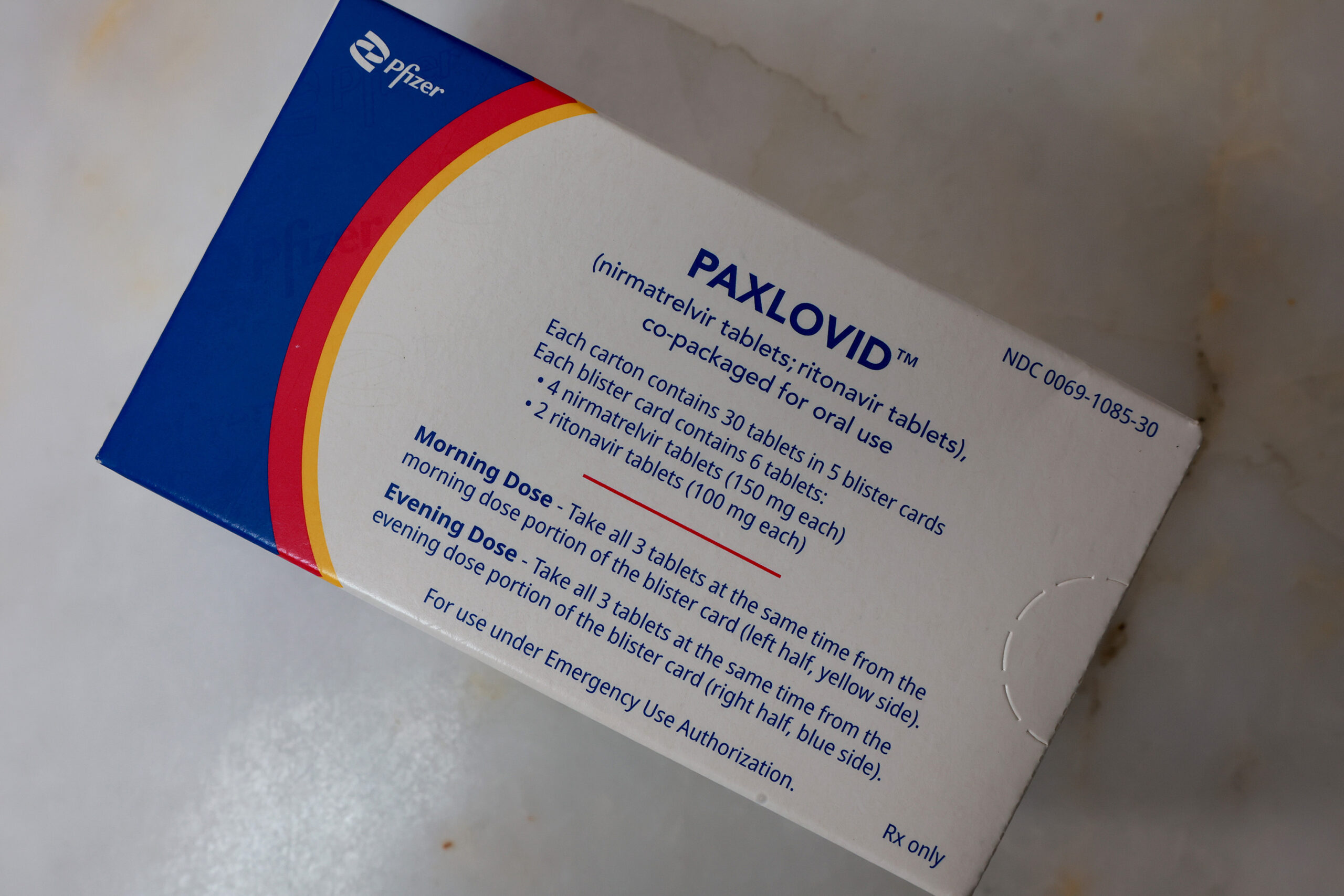 A box of Paxlovid is photographed from above.